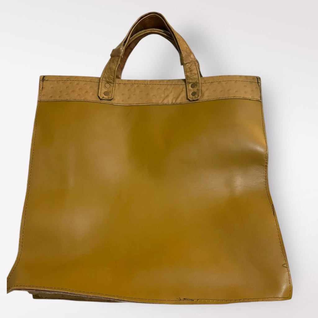 Tan and brown ostrich leather tote bag with a boho touch