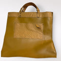 Tan and brown ostrich leather tote bag with a boho touch