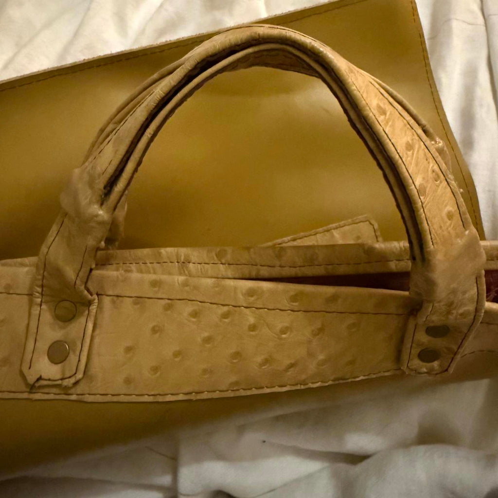 Tan and brown ostrich leather tote bag with a boho touch