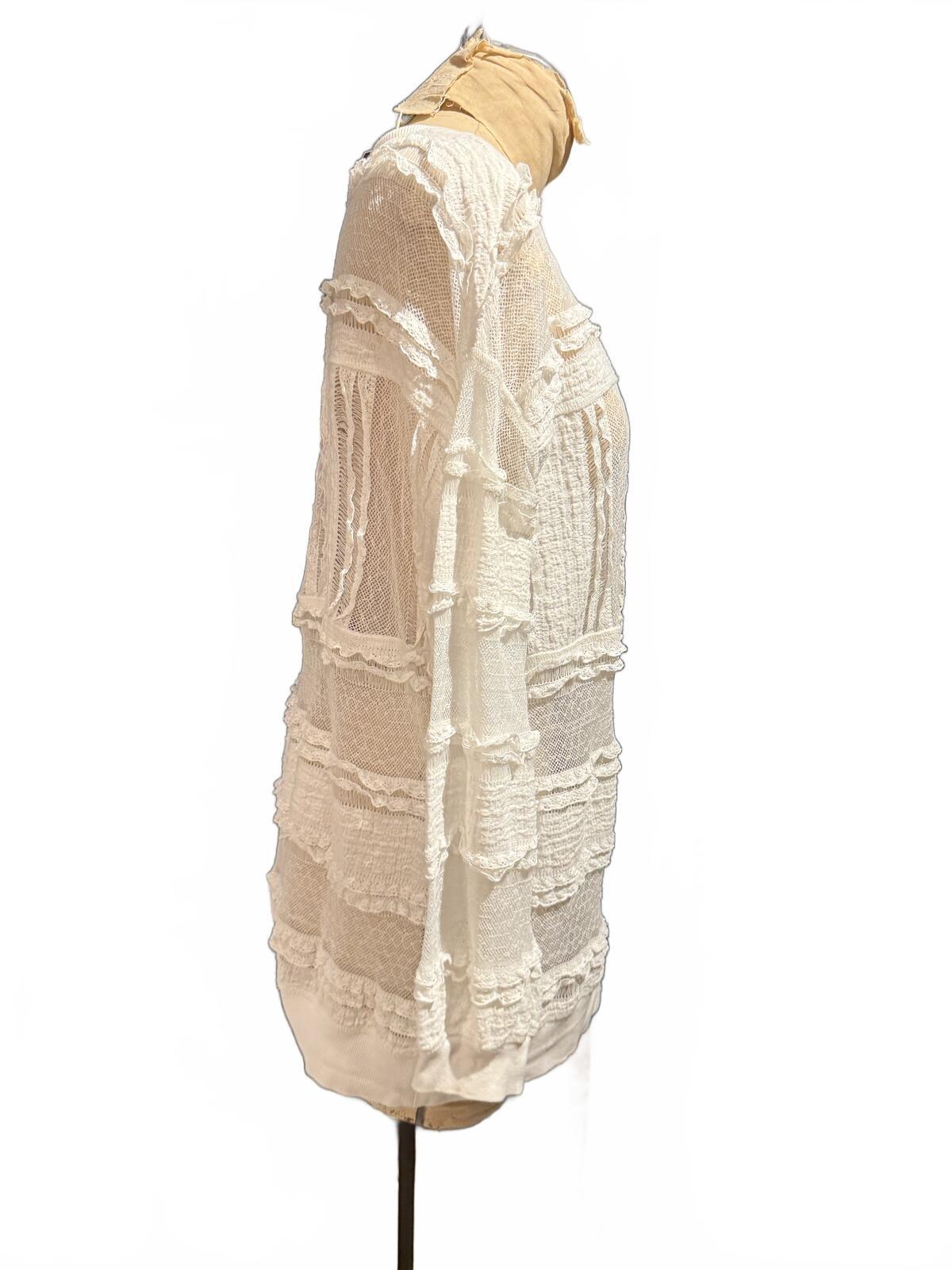 Skye’s The Limit Cream Textured Sheer Long Sleeve Knit Top