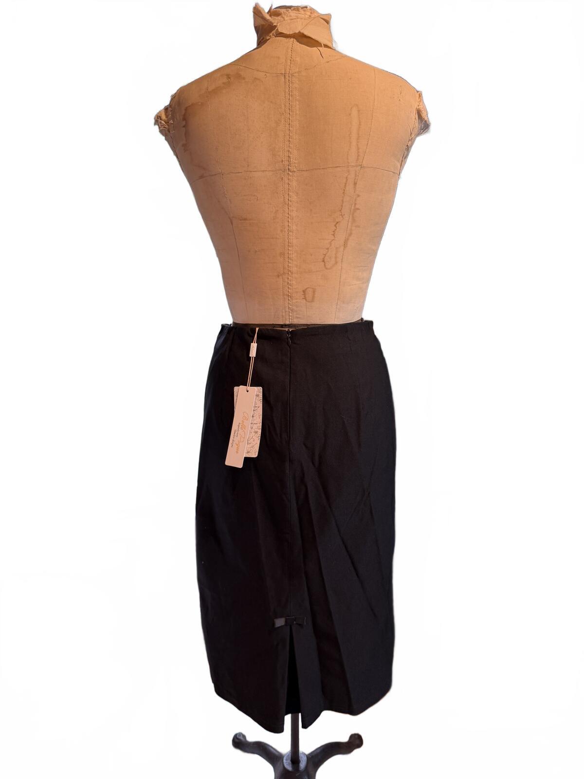 Belle Pogue Black Midi Pencil Skirt with Front Slits and Bow Detail