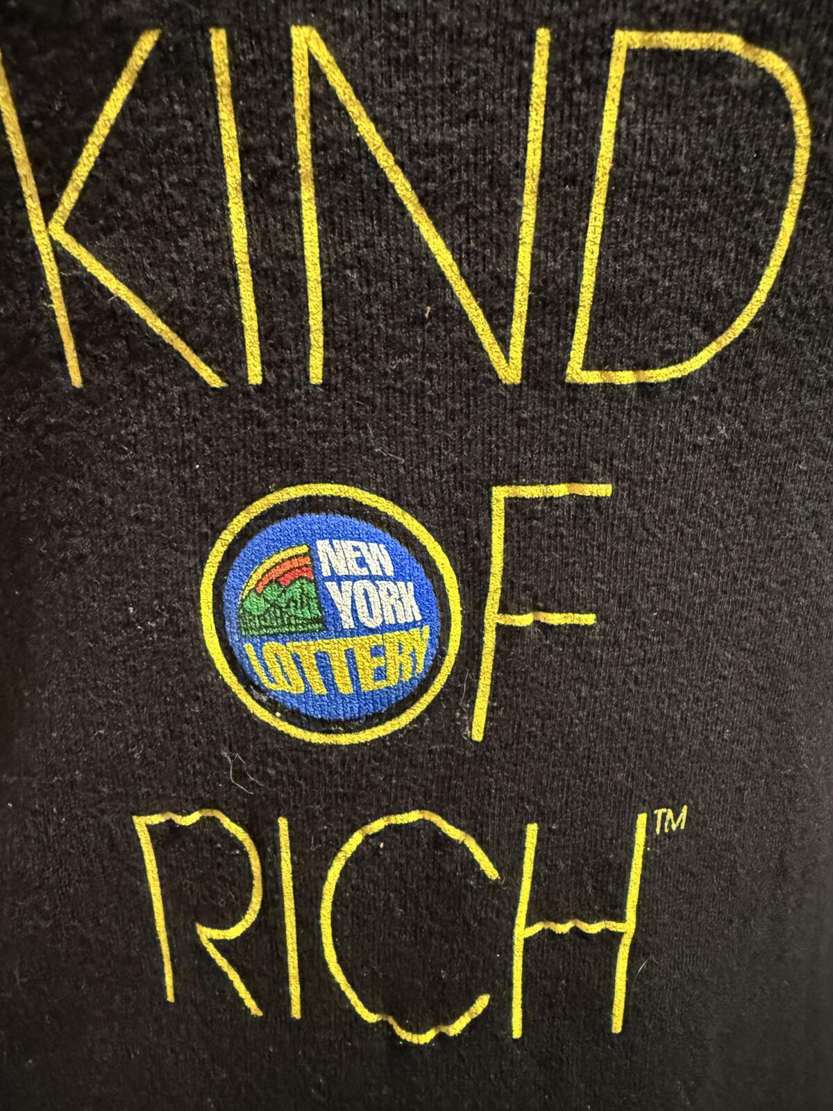 Black Graphic Tee with 'YEAH, THAT KIND OF RICH' Text