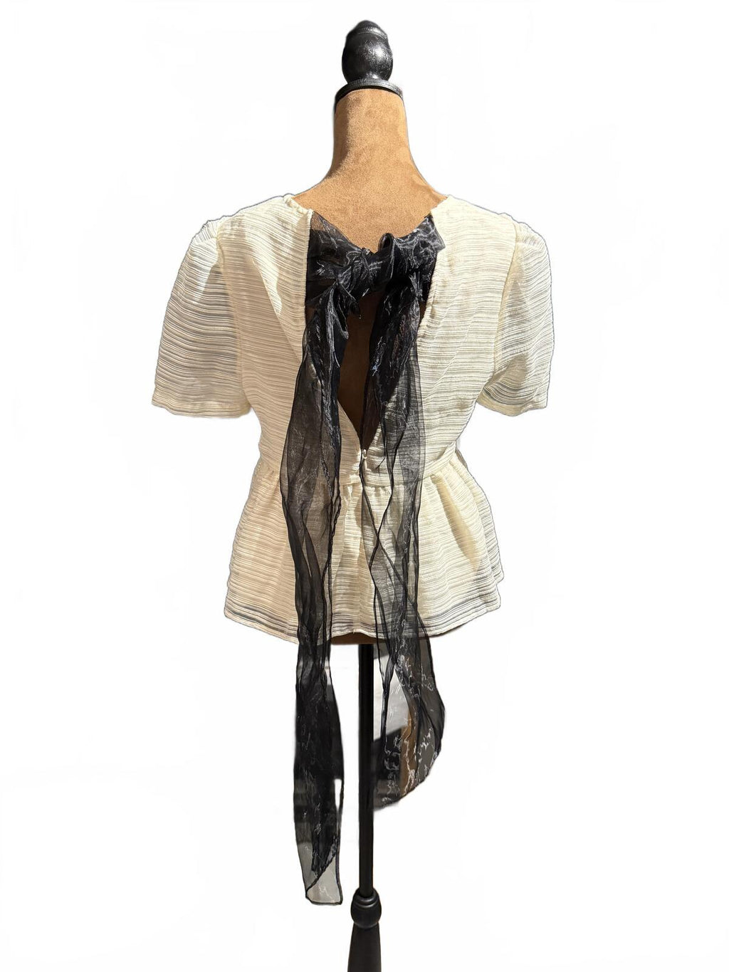 Sunday in Brooklyn Cream Textured Peplum Top with Black Sheer Bow Back