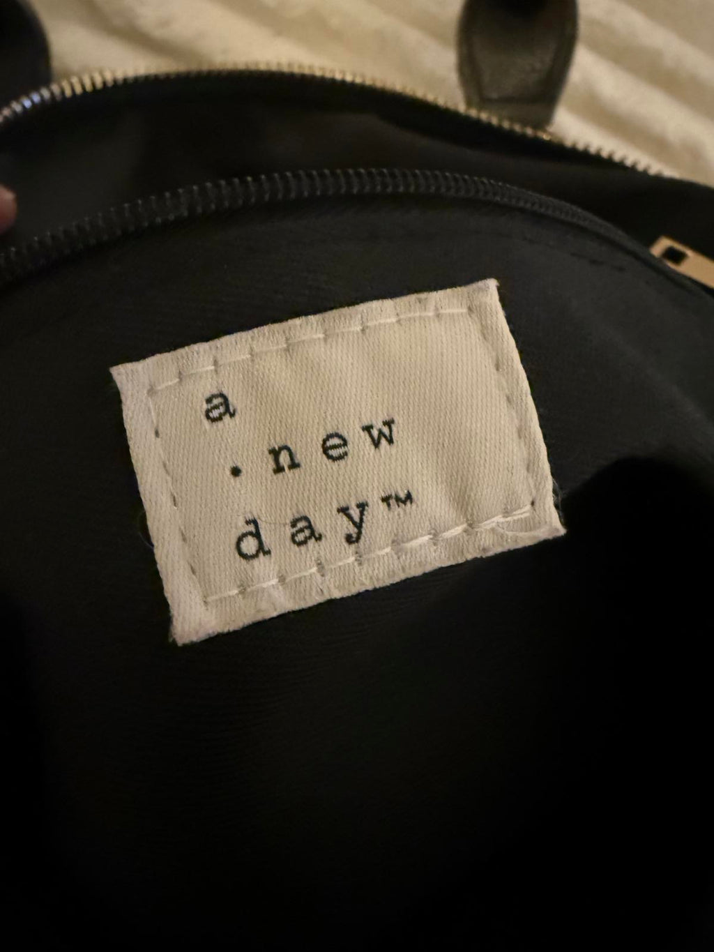 A New Day Black Handbag with Dual Handles and Adjustable Strap