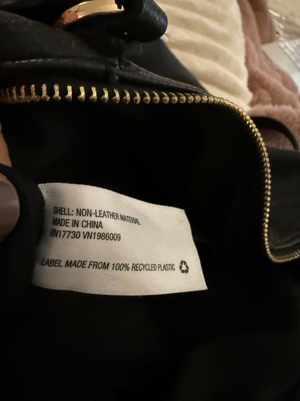 A New Day Black Handbag with Dual Handles and Adjustable Strap