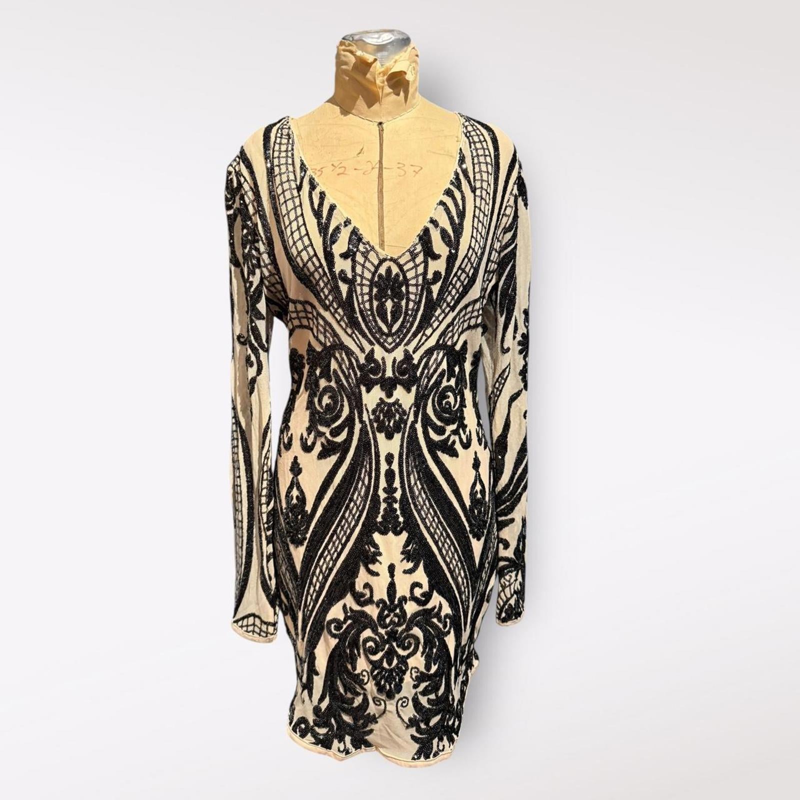 ReVamped Long Sleeve Black Sequin Embellished Dress with Nude Mesh Base