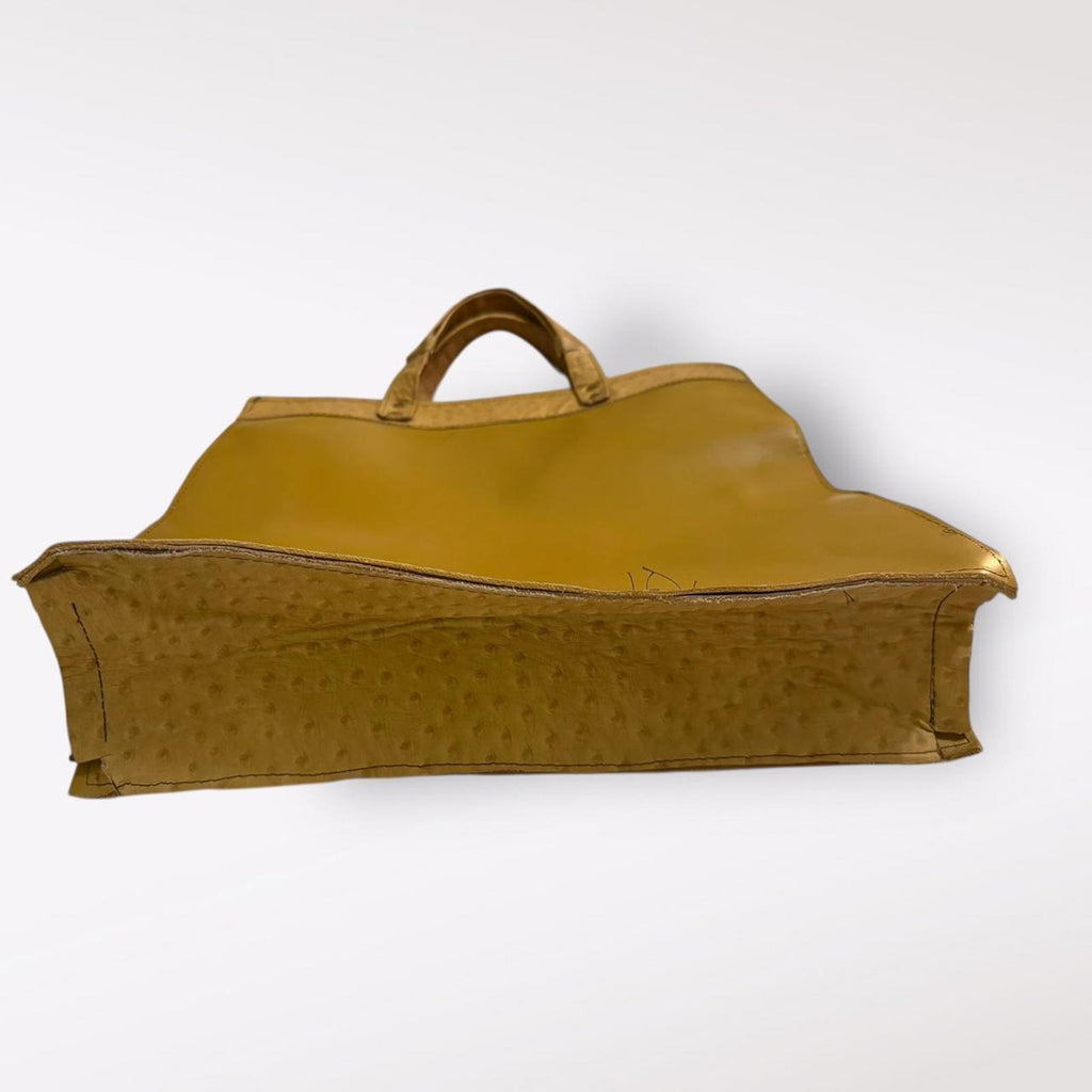 Tan and brown ostrich leather tote bag with a boho touch