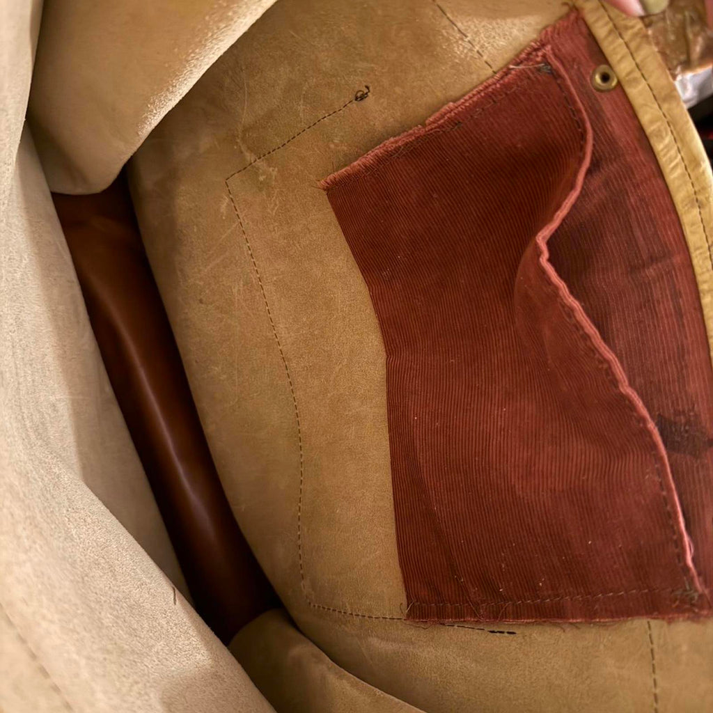 Tan and brown ostrich leather tote bag with a boho touch