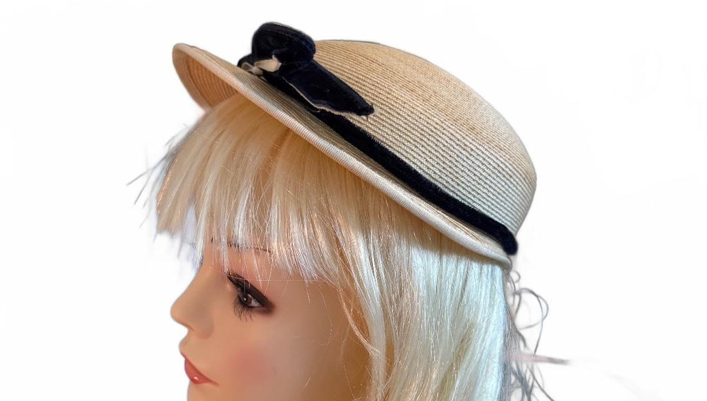 Vintage Style Beige Straw Hat with Black Velvet Bow and Pearl Accent